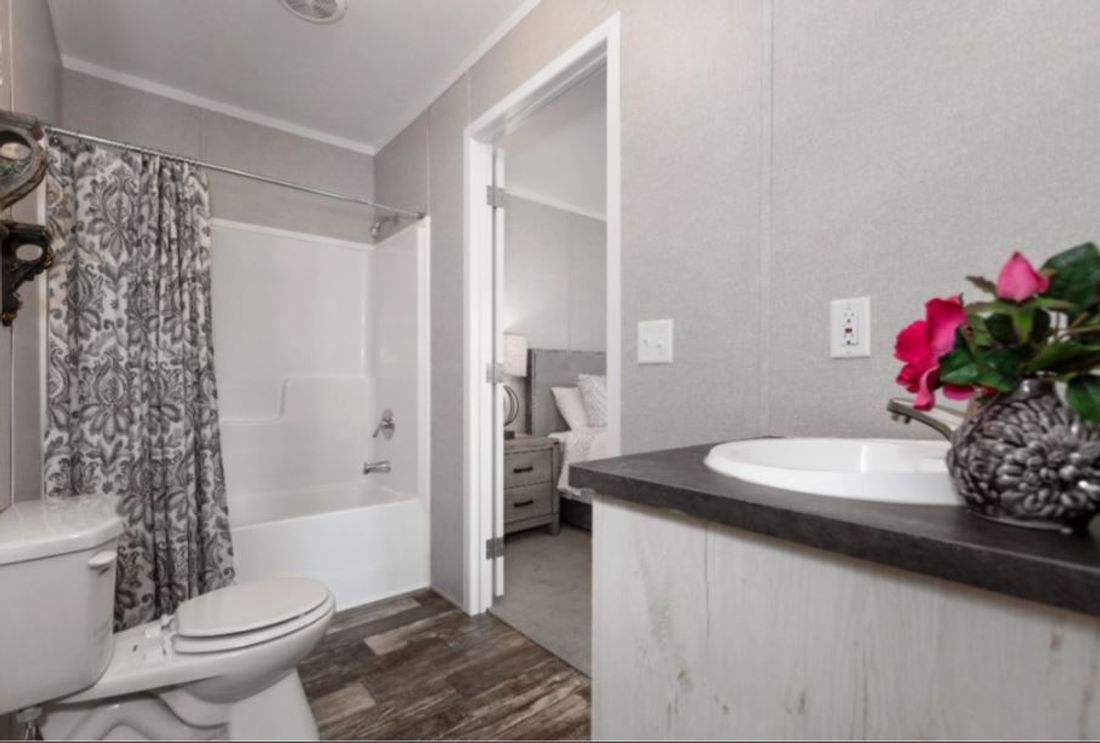 The TOPAZ Primary Bathroom. This Manufactured Mobile Home features 3 bedrooms and 2 baths.