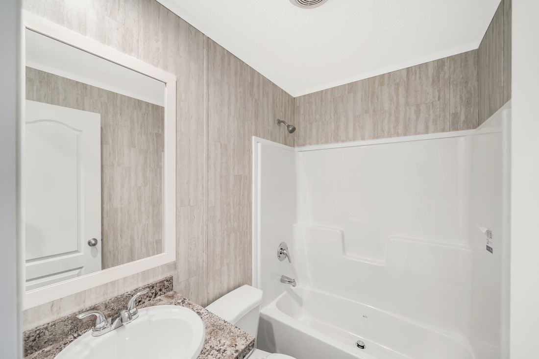 The RUBY Guest Bathroom. This Manufactured Mobile Home features 2 bedrooms and 2 baths.