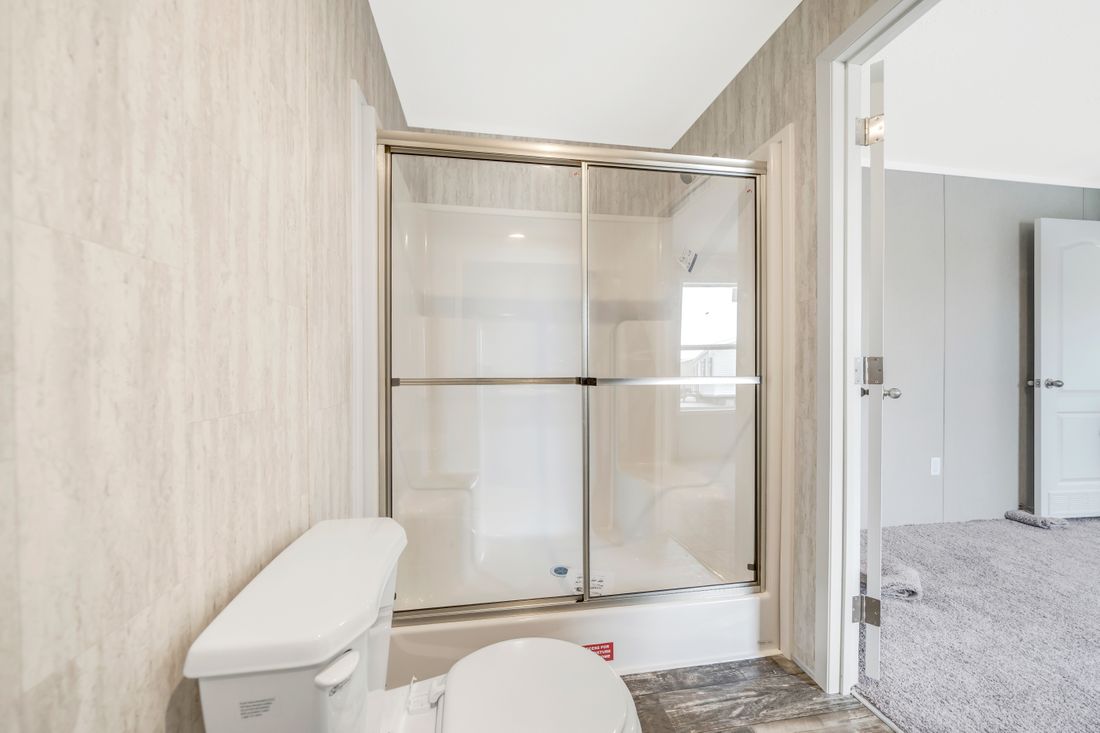 The RUBY Primary Bathroom. This Manufactured Mobile Home features 2 bedrooms and 2 baths.