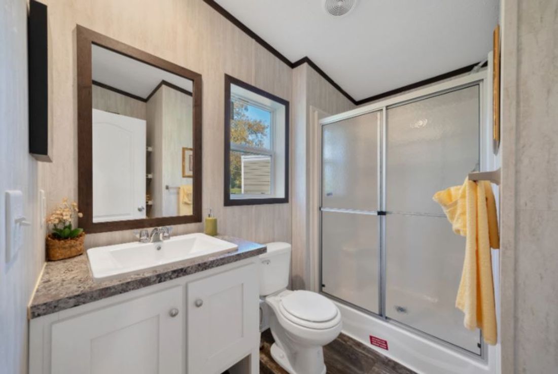The ZIRCON Primary Bathroom. This Manufactured Mobile Home features 3 bedrooms and 2 baths.