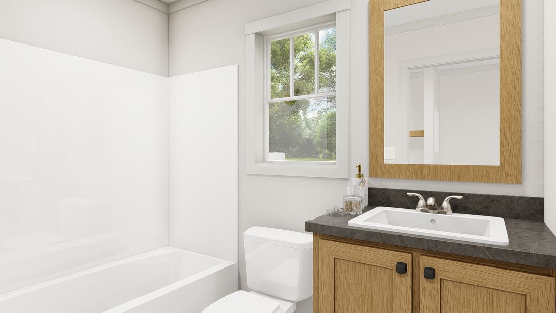 The 1010 "GOOD VIBRATIONS" 6614 Guest Bathroom. This Manufactured Mobile Home features 3 bedrooms and 2 baths.