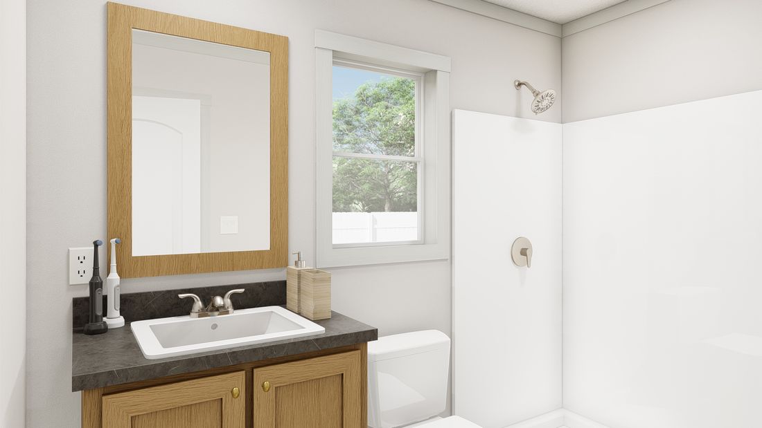 The 1010 "GOOD VIBRATIONS" 6614 Primary Bathroom. This Manufactured Mobile Home features 3 bedrooms and 2 baths.
