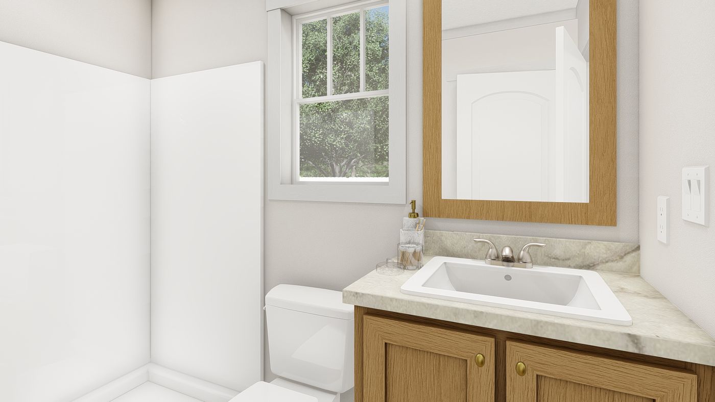 The 1001 "LAYLA" 5216 Guest Bathroom. This Manufactured Mobile Home features 2 bedrooms and 1 bath.