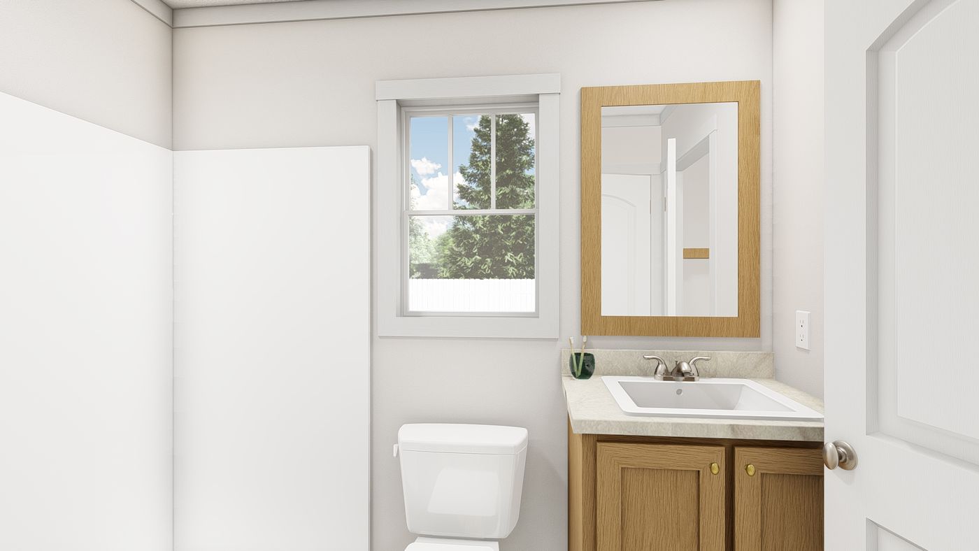The 1000 "YESTERDAY" 4416 Guest Bathroom. This Manufactured Mobile Home features 1 bedroom and 1 bath.