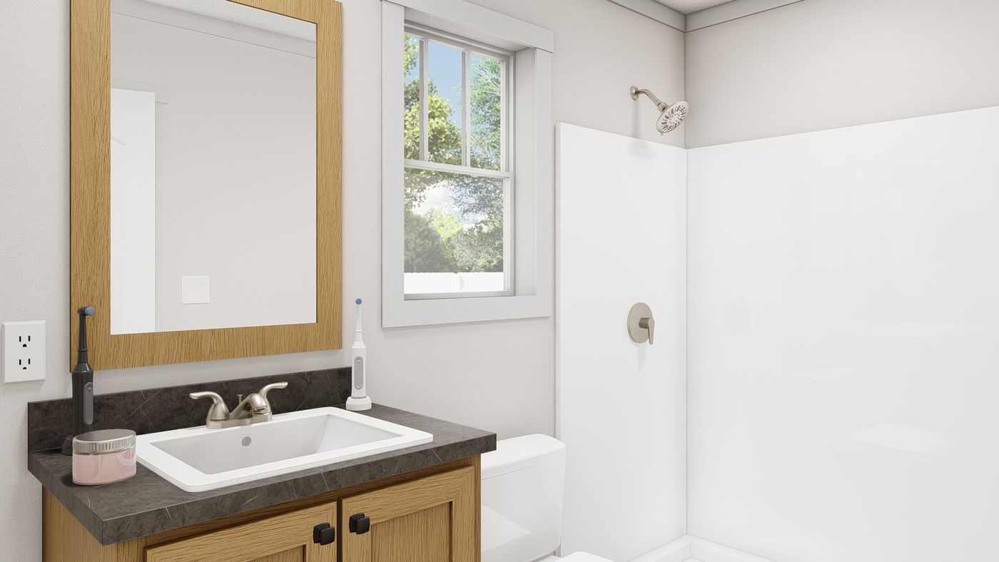 The 1009 "RESPECT" 6014 Primary Bathroom. This Manufactured Mobile Home features 2 bedrooms and 2 baths.