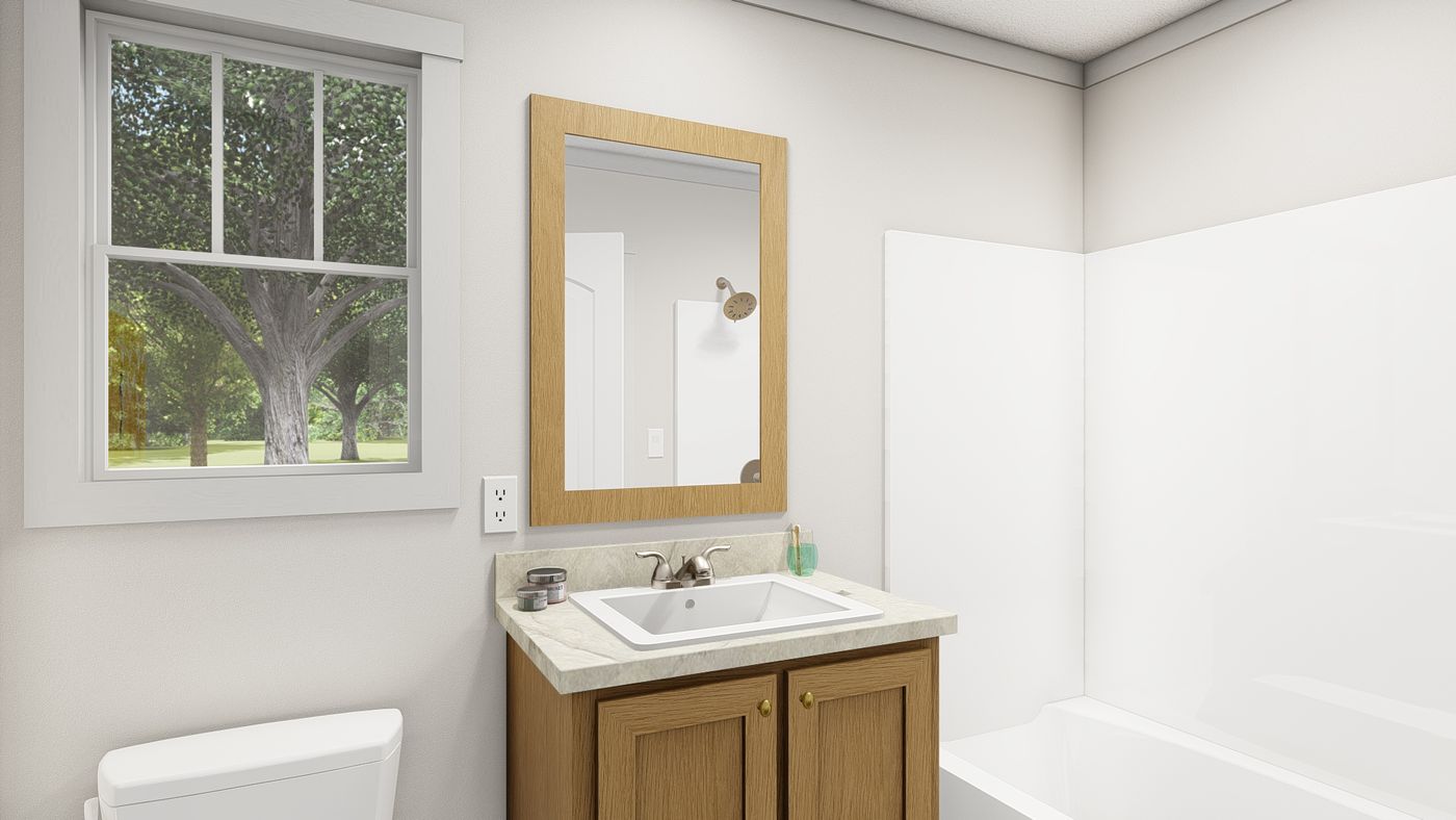 The 1008 "SATISFACTION" 4814 Guest Bathroom. This Manufactured Mobile Home features 2 bedrooms and 1 bath.