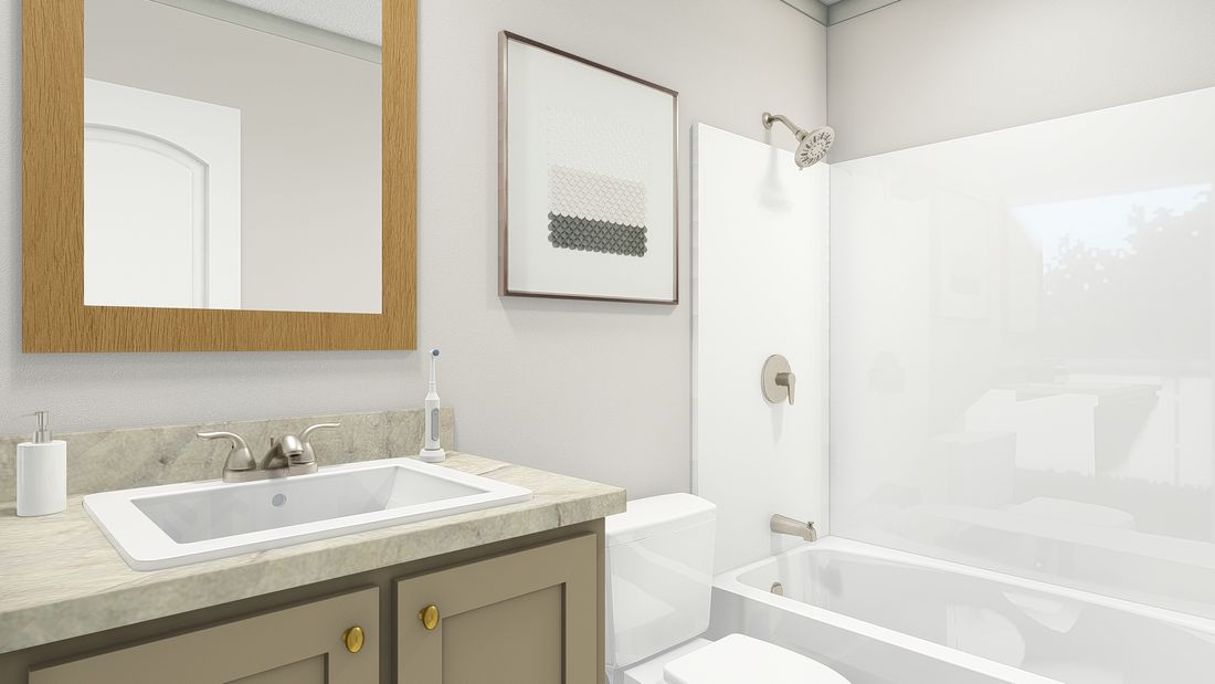 The 2006 "BEAUTIFUL MORNING" 4428 Guest Bathroom. This Manufactured Mobile Home features 3 bedrooms and 2 baths.