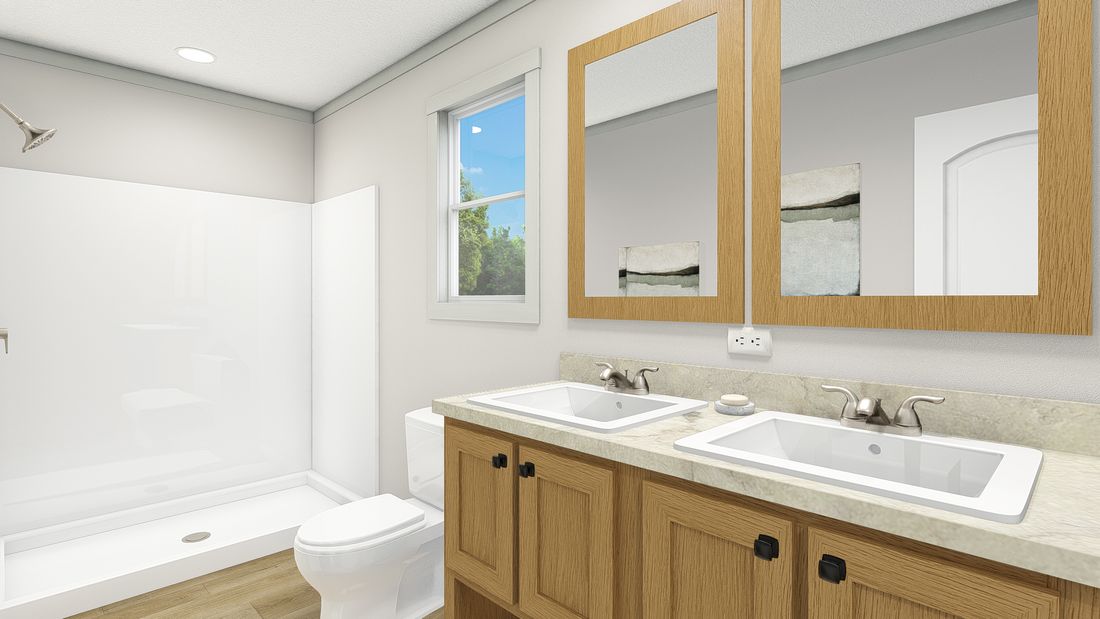 The 2006 "BEAUTIFUL MORNING" 4428 Primary Bathroom. This Manufactured Mobile Home features 3 bedrooms and 2 baths.